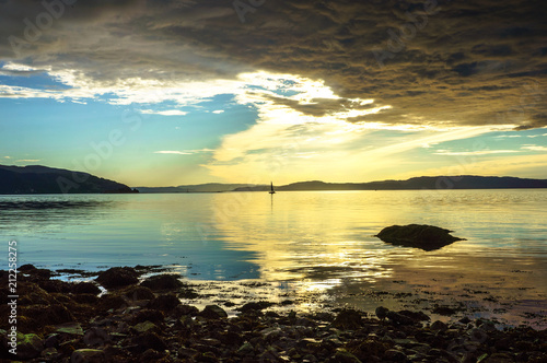 Dramatic sunset on the beach in Trondheim. Norway