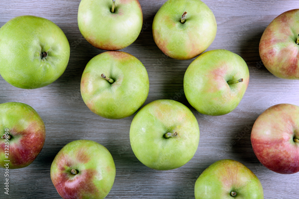 fresh apples on a gray wooden background fresh apples on a gray wooden background