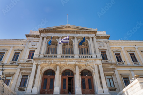Facade of the neoclassical city Hall by Ernst Ziller in Miaouli square  Syros island  Cyclades  Greece