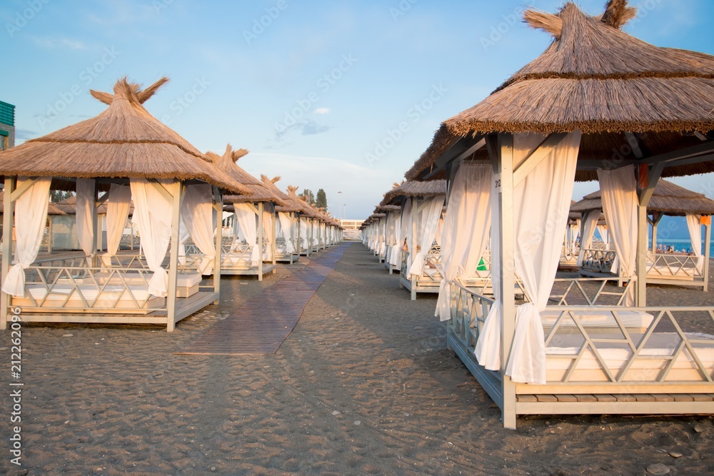 Fototapeta premium Beach gazebo at sunset