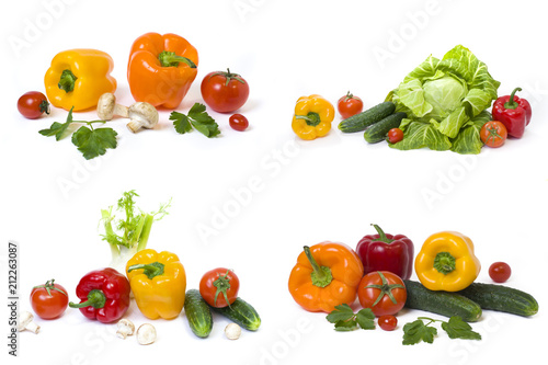 Red pepper with yellow pepper and tomatoes on a white background. Cucumbers with peppers and tomatoes.