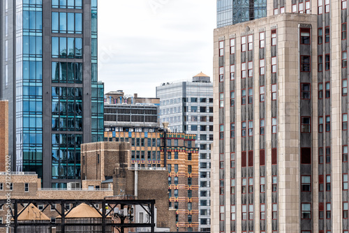 Closeup pattern of modern skyscraper buildings architecture, sky in New York City NYC aerial view through window, many windows