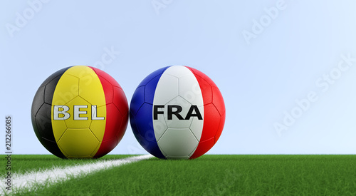 Belgium vs. France Soccer Match - Soccer balls in Belgium and France national colors on a soccer field. Copy space on the right side - 3D rendering