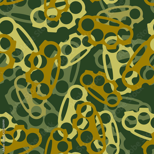 Brass knuckles military pattern seamless. weapon bully Khaki soldiery texture. Green Camouflage army background . protective ornament vector illustration