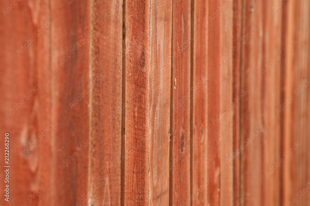 Old wood background with shabby red paint.close-up Old wood background with shabby red paint.close-up
