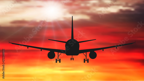 Passenger plane is flying, against the background of sunset. Airplane silhouette vector