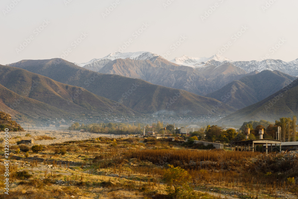 fascinating nature, high mountains and boundless yellow fields, autumn landscape