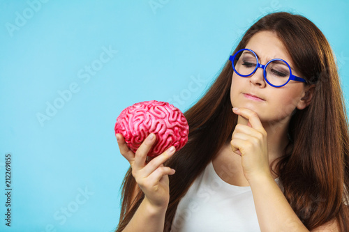 Woman with fake brain thining
