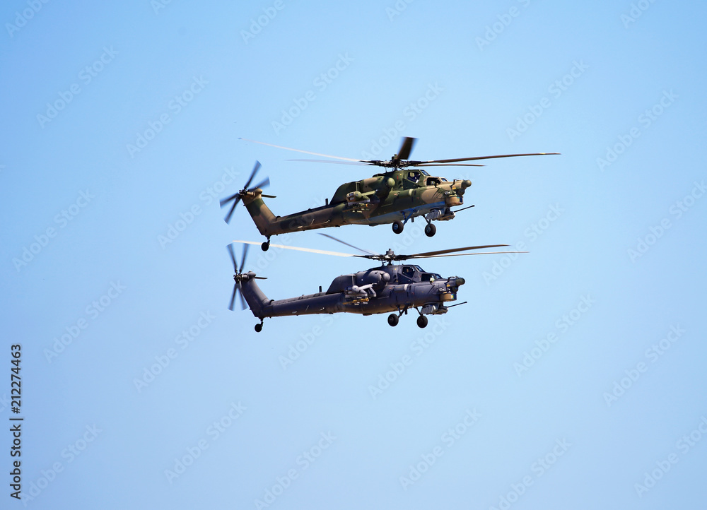 Fototapeta premium Two combat helicopters in flight
