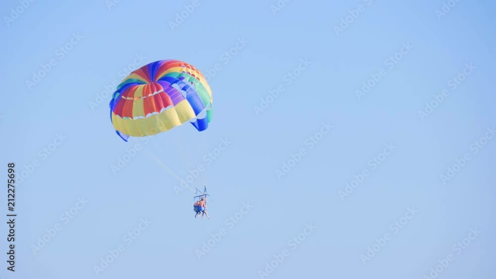 Paratrooper soars in blue sky with clouds. Paratrooper soars in blue sky with clouds.