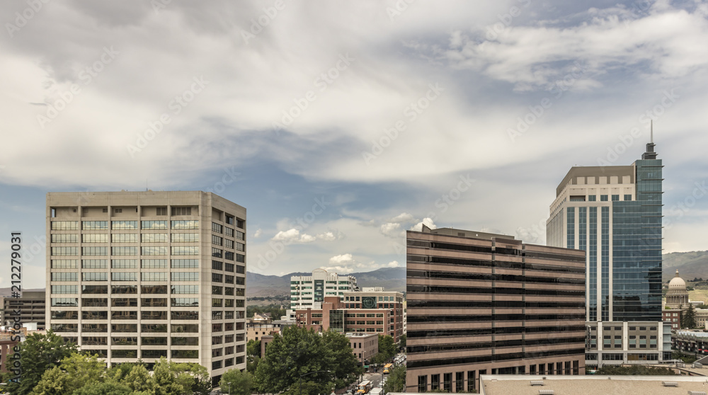 Downtown Boise Cityscape. View from the south of skyscrapers, streets, the State Capital building and the foothills on a summer afternoon. Boise, Idaho, USA