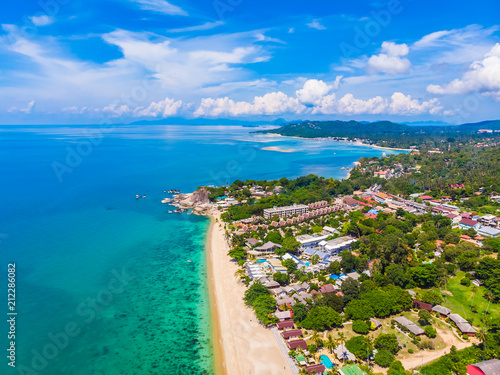 Aerial view of beautiful tropical beach and sea with palm and other tree in koh samui island photo