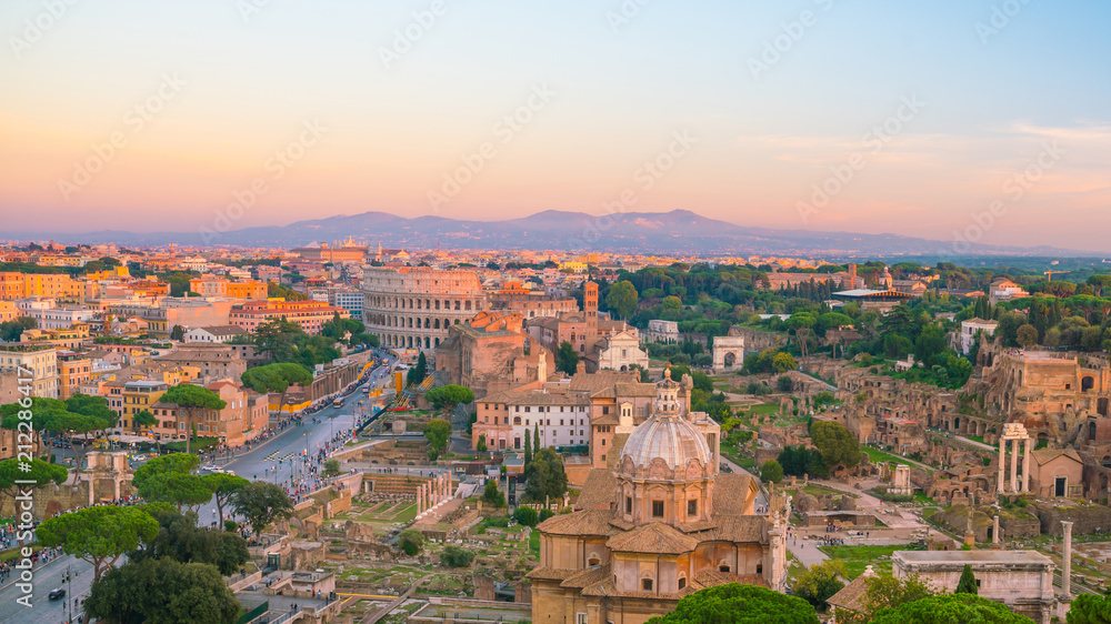 Top view of  Rome city skyline with Colosseum and Roman Forum