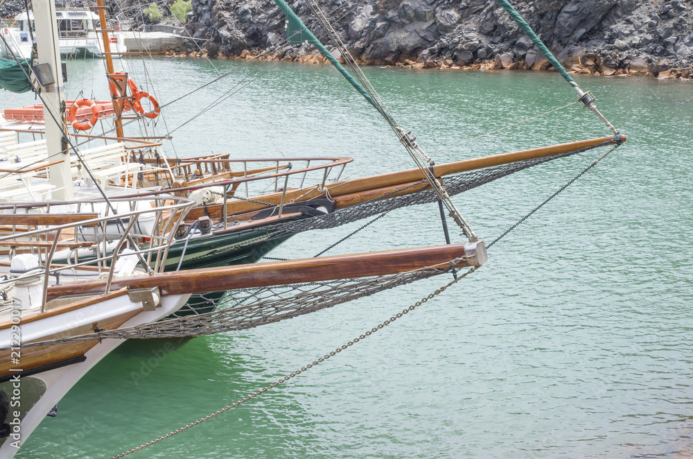 Bows on wooden ship in the sea, Santorini
