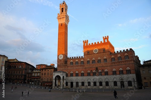 Sunset view of Piazza del Campo Square and Palazzo Pubblico City Hall in Siena, Tuscany, Italy