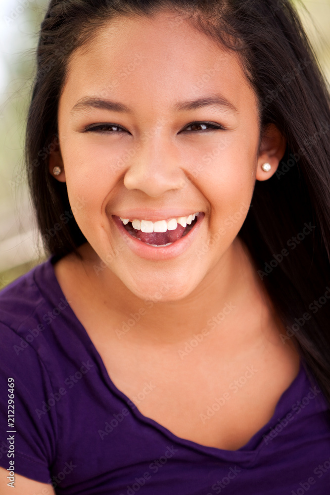 Asian teenage girl smiling. Asian teenage girl smiling.