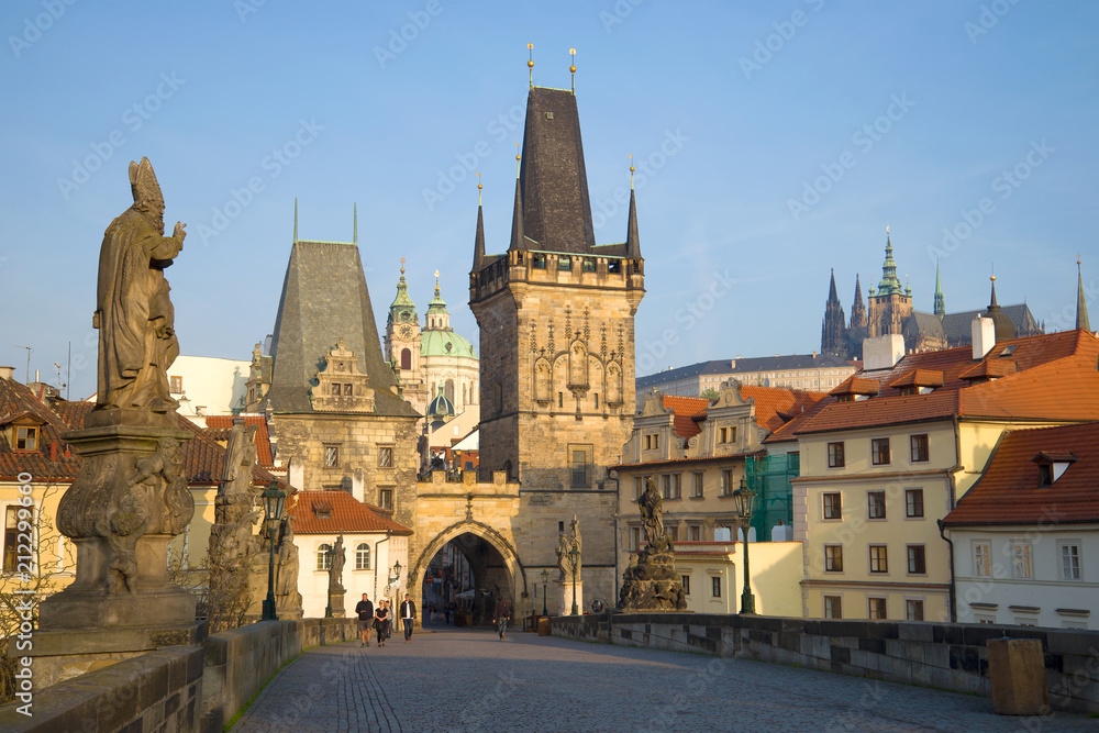 View of the Western bridge towers of Karlov Bridge in the April morning. Prague, Czech Republic