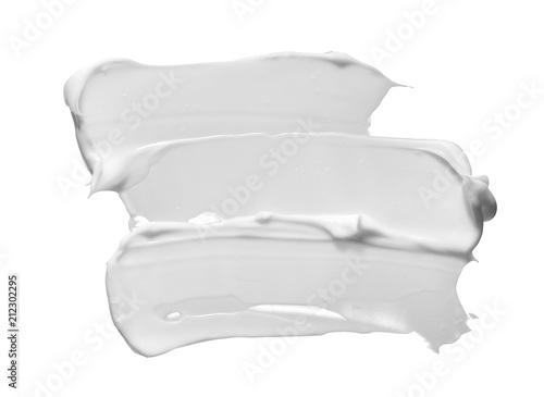 White smear of cosmetic cream isolated on white