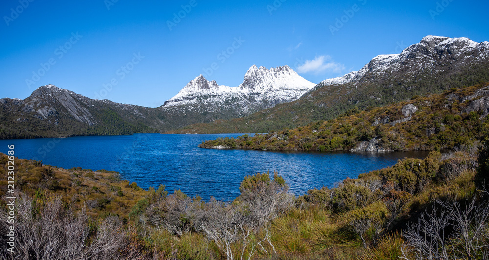 Beautiful panoramic view of cradle mountain and Dove Lake on a sunny winter day.