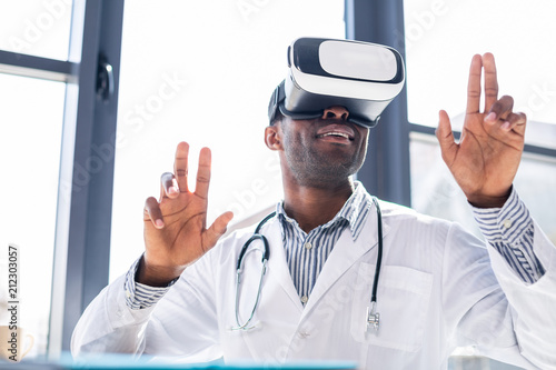 Positive delighted man being in virtual life
