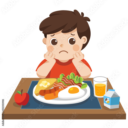 Concept of Health and growing children. Little boy unhappy to eat breakfast.