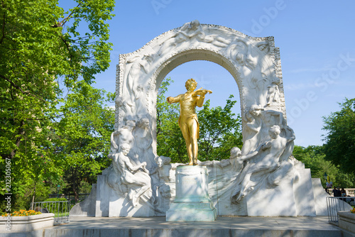 Monument to Johann Strauss in the city park on a sunny afternoon. Vienna