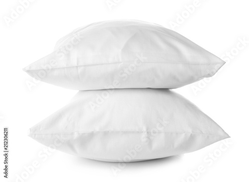 Soft orthopedic pillows on white background