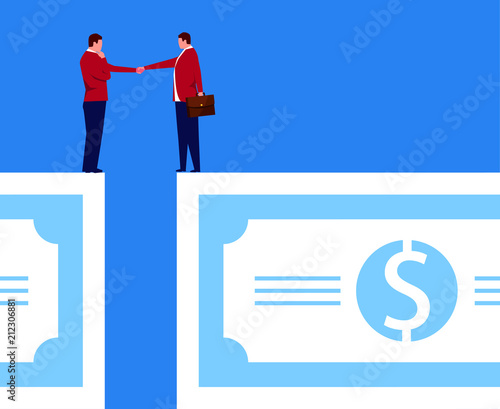 Businessman standing on money shaking hands