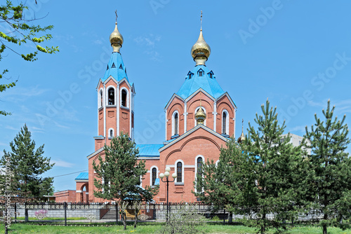 Cathedral of Our Lady of Kazan against clear blue sky, Komsomolsk-on-Amur, Russia photo
