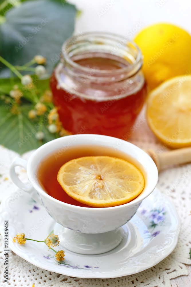 Herbal tea with linden flowers, honey and lemon