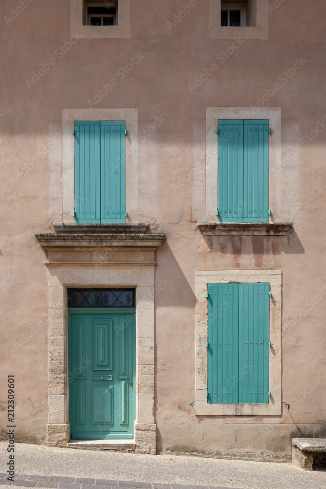 Turquoise doors and windows in Venasque, Provence, France