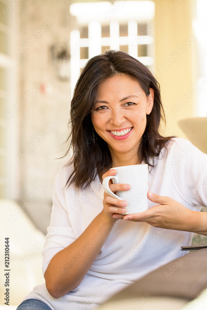 Portrait of an Asian woman smiling. Portrait of an Asian woman smiling.