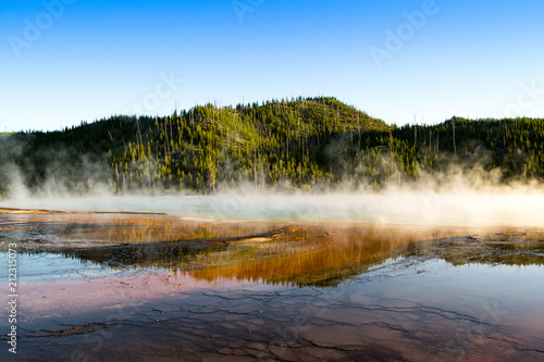 Sunset in the Grand Prismatic Spring, Yellowstone National Park © Antonio_g_m