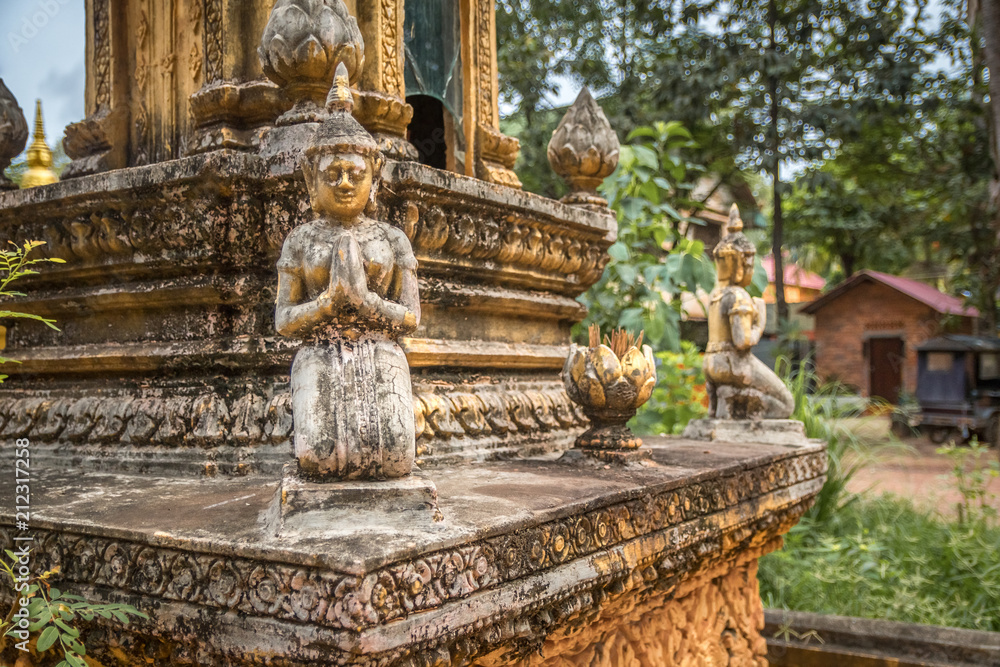 detail of decorative ornaments of golden stupa in buddhist temple in cambodia