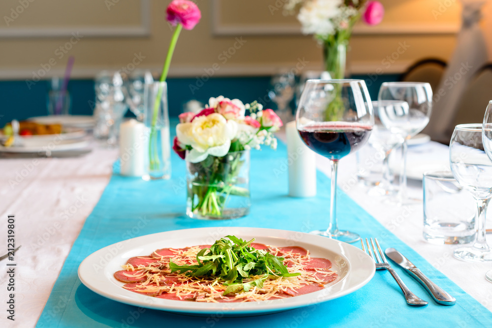 Fototapeta premium carpaccio on the table in the restaurant