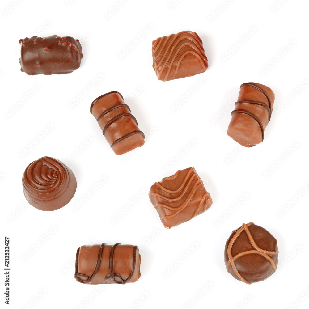 Fototapeta premium Assortment of chocolate candies isolated on white background.
