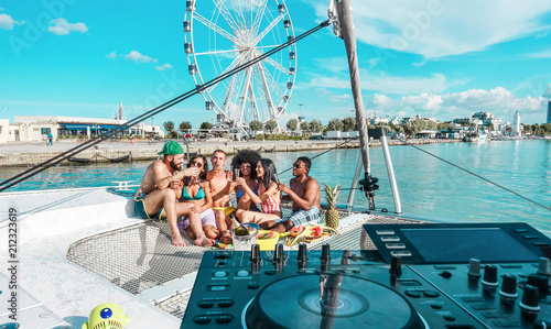 Photography Happy friends drinking champagne in summer boat party