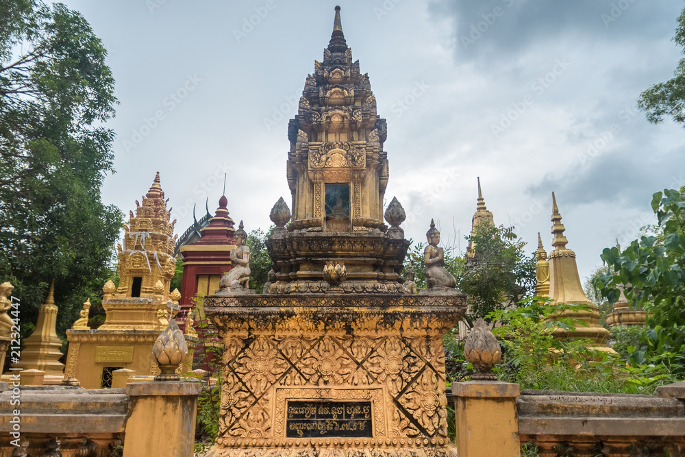 golden stupas in a buddhist temple in cambodia