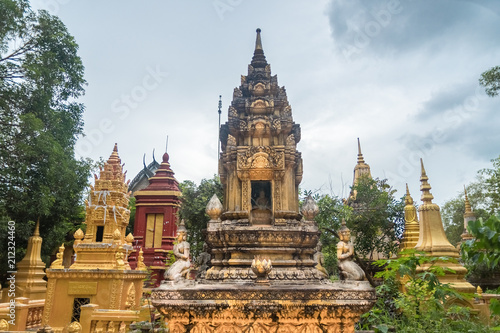 golden stupas in a buddhist temple in cambodia © Sergio de Flore