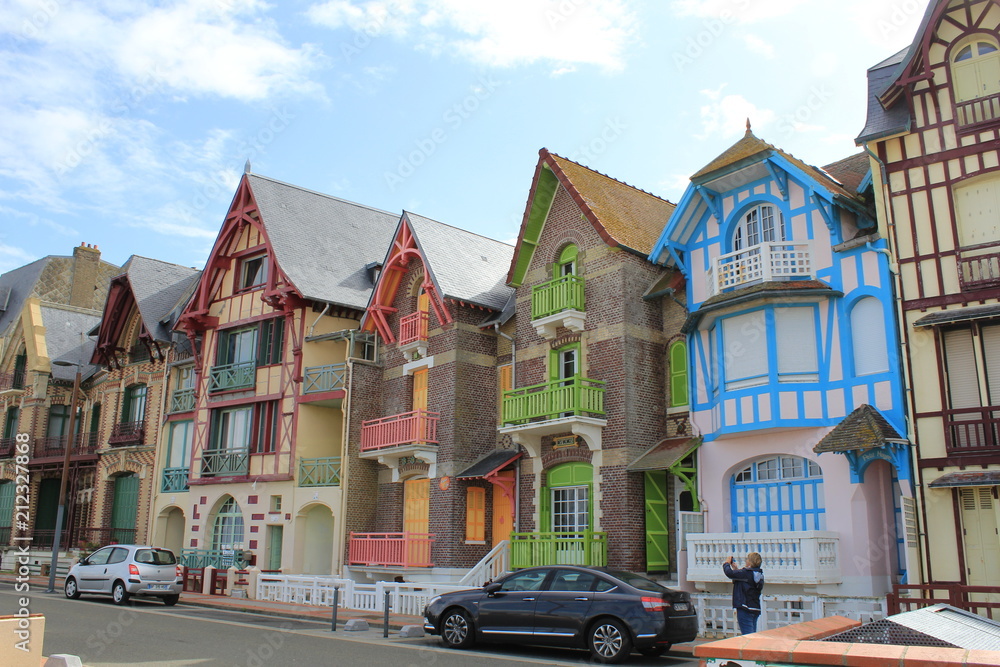 beautiful row of ancient houses in le treport, normandy, france along the boulevard