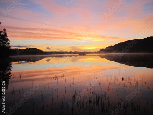 Fototapeta Naklejka Na Ścianę i Meble -  Sunrise over the lake...Wolflake ...Os...Norway