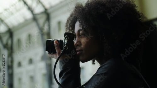 Young traveler on railroad station