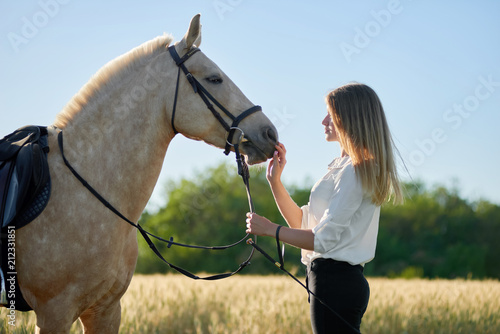 a girl with a horse