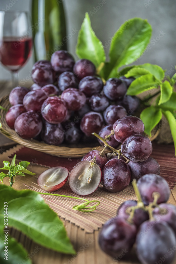 Fototapeta premium Healthy fruits Red grapes in the vineyard,