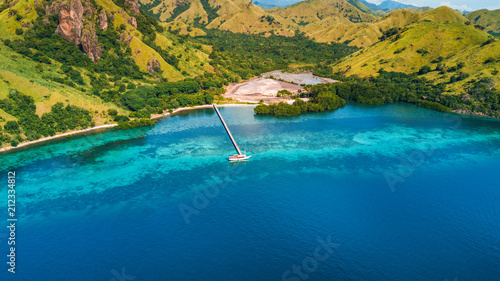 Aerial view of Marijite Bridge, a wooden pier in front of the private island from Komodo Island (Komodo National Park), Labuan Bajo, Flores, Indonesia