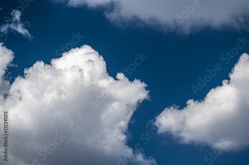 Summer blue sky and clouds background