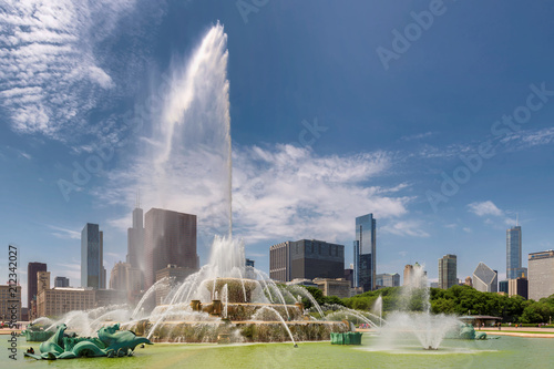 Chicago downtown and Buckingham Fountain at sunny day in Grant Park, Chicago, Illinois, USA.
