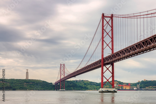 The 25 April bridge  Ponte 25 de Abril  at cloudy day  Lisbon  Portugal.