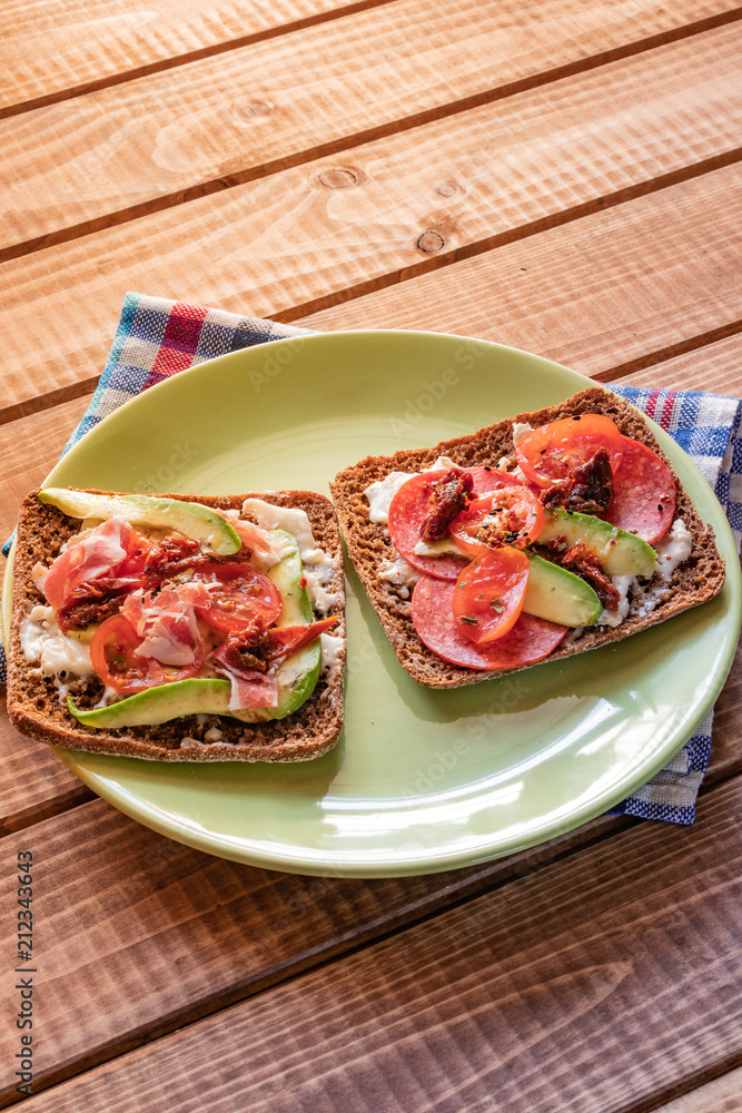 Toast with vegetables and ham