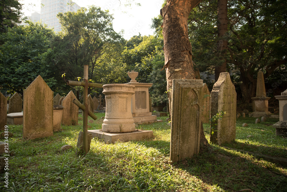 Fototapeta premium Cemetery in Hong Kong downtown on sunny day